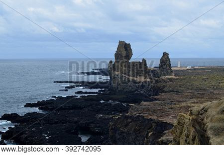 Beautiful Rugged Sea Cliffs Along The Coast Of Iceland.