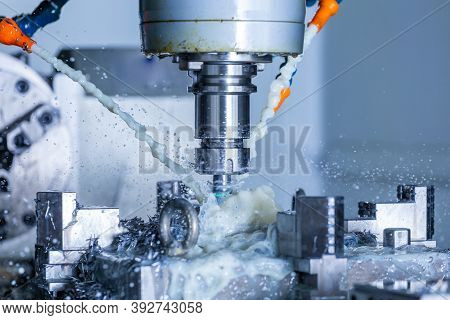 Vertical Cnc Steel Milling Process With External Water Coolant Streams, Splashes And A Lot Of Metal 