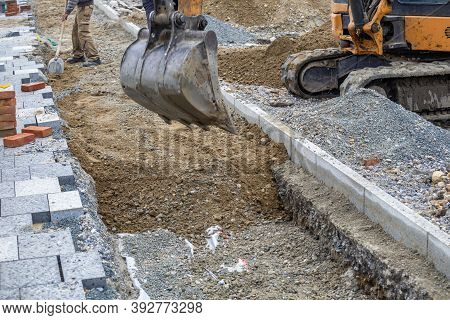 Backfill And Power Cables Installation During A Sidewalks Or Patio Reconstruction Project. Selective
