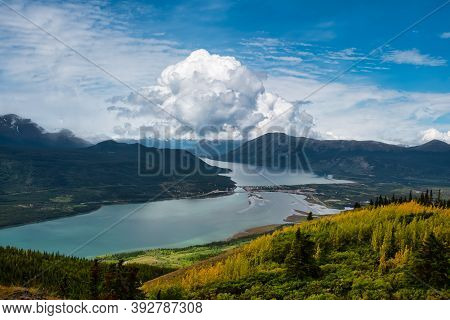 Beautiful View Of A Small Touristic Town, Carcross, Surounded By Canadian Mountain Landscape. Locate