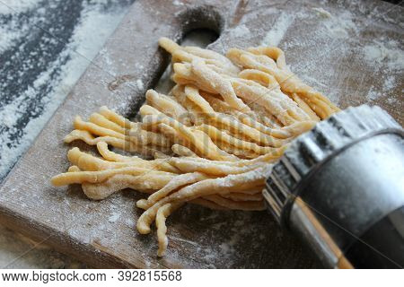 Machine For Cooking Pasta. The Dough For Pasta.metal Machine For Production Of Pasta And Ingredients