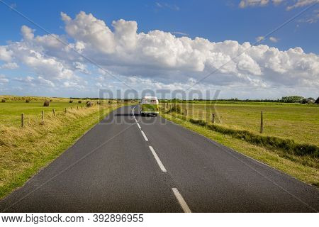 Barfleur, France - September Circa, 2020. Road In The Middle Of Natural Country Landscape With A Van