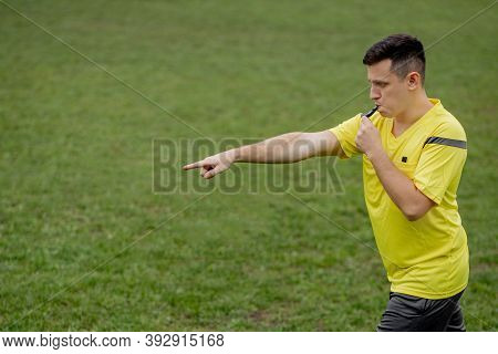 Referee Showing On Penalty While Gaming. Concept Of Sport, Rules Violation, Controversial Issues, Ob