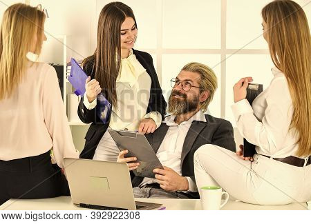 Flirting With Boss. Surrounded By Beautiful Ladies. Man And Women Business Colleagues. They Love The