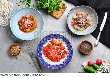 Table With Many Salad Top View. Different Salads On Concrete Table, Top View. Vegetable Salad, Salad