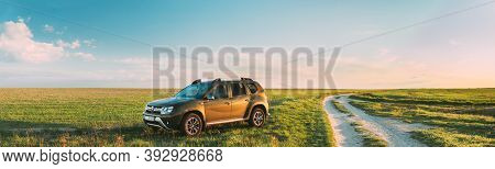 Gomel, Belarus - May 6, 2020: Renault Duster Suv Parked Near Countryside Road In Spring Field Countr