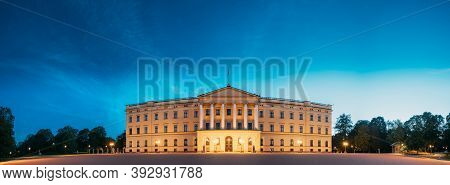 Oslo, Norway. Royal Palace - Det Kongelige Slott In Summer Evening. Night View Of Famous And Popular