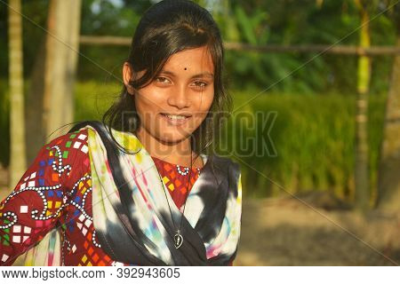 Close Up Of An Indian Bengali Teenage Girl With Long Dark Hairs Wearing Traditional Dress Salwar Kam