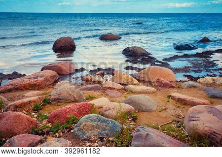 Rocky Sea Coast. Boulders In The Sea And On The Shore. Latvian Nature