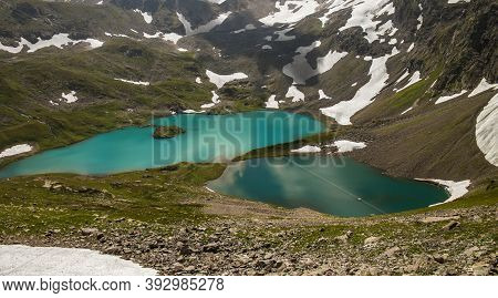 View Of The Imereti Lake From The Height Of The Mountain Peak. Blue Lake Surrounded By Mountains And
