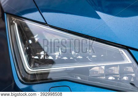 Close Up Photo Of Modern Car, Detail Of Headlight. Headlight Car Projector Led Of A Modern Luxury Te