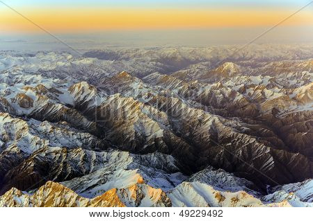 Aerial Of The Mountains In Tashkent, China And Kirgistan, Covered With Snow
