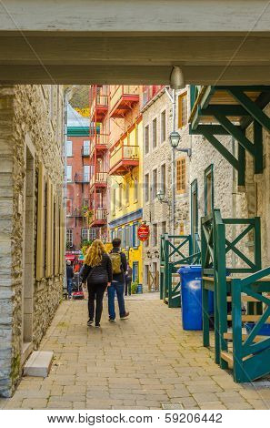 QUEBEC CITY, CANADA, OCTOBER 13, 2013 - tourists visiting alleys in Old Town
