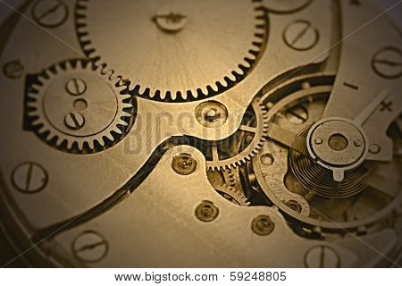 Clockwork details, pinions and wheels closeup