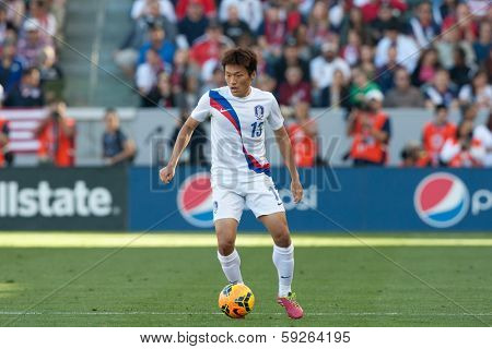 CARSON, CA. - FEB 01: Korea M Myung-Joo Lee #13 in action during the U.S. mens national team soccer friendly against Korea Republic on Feb 1st 2014 at the StubHub Center in Carson, Ca.