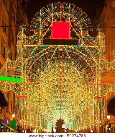 Beautiful night lights in Fallas fest of Valencia in calle Sueca street Spain
