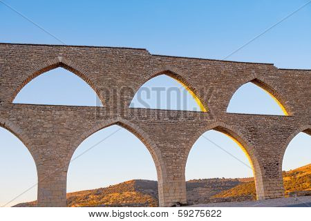 Morella aqueduct in Castellon Maestrazgo at Spain blue sky