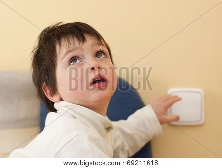 Child And A Light Switch