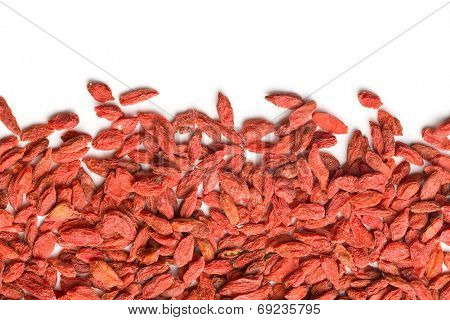 dried goji berries on white background