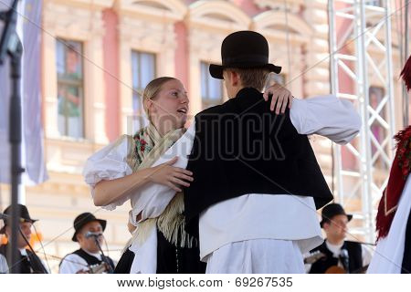 ZAGREB, CROATIA - JULY 19: Members of folk group Seljacka sloga from Donja Dubrava, Croatia during the 48th International Folklore Festival in center of Zagreb, Croatia on July 19, 2014