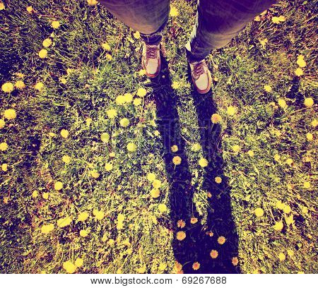  a shot of yellow and white boat or deck shoes done with a retro vintage instagram filter 