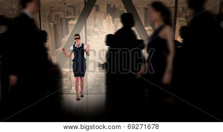 Business people walking in a blur against room with large window looking on city