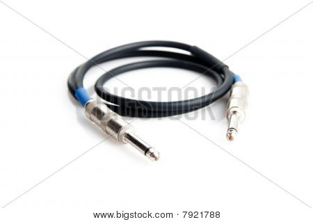 Un câble de guitare électrique black