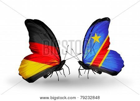 Two Butterflies With Flags On Wings As Symbol Of Relations Germany And Kongo
