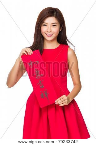 Chinese Woman hold with fai chun, phrase meaning is everything goes smooth and good luck 