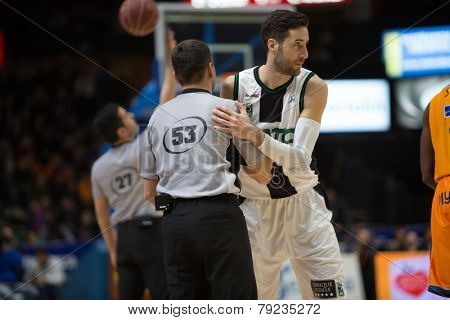 VALENCIA, SPAIN - DECEMBER 30: Vidal (R) and referee (L) during Spanish League match between Valencia Basket Club and Juventut at Fonteta Stadium on December 30, 2014 in Valencia, Spain