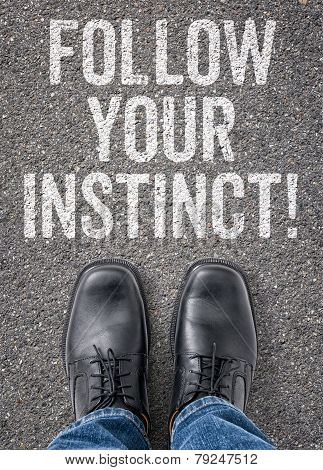 Text on the floor - Follow your instinct