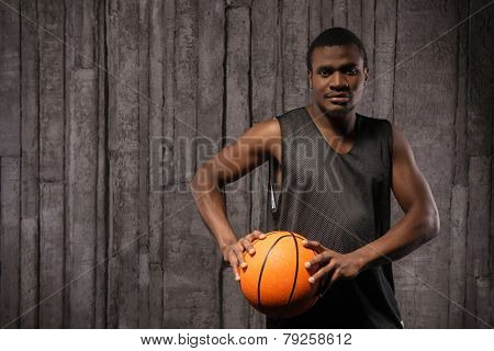 Afro-american man holding basketball