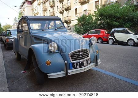 GENEVA - SEP 11: old Citroen car at Geneva downtown on September 11, 2014 in Geneva, Switzerland. Citroen is a major French automobile manufacturer, part of the PSA Peugeot Citroen group since 1976.