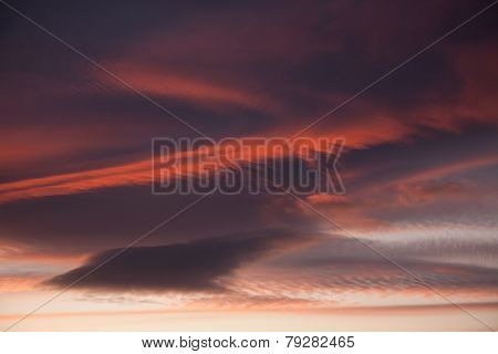 Clouds on sunset sky background