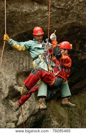 Cavers work out rescue operations in caves.