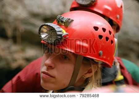 Cavers work out rescue operations in caves.