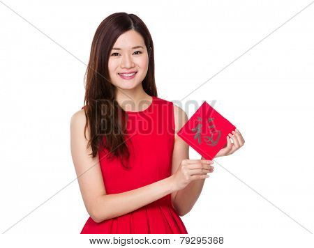 Asian woman hold with china Fai Chun, word meaning is good blessing for you 