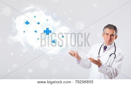 Proffesional doctor listening to abstract cloud with medical signs