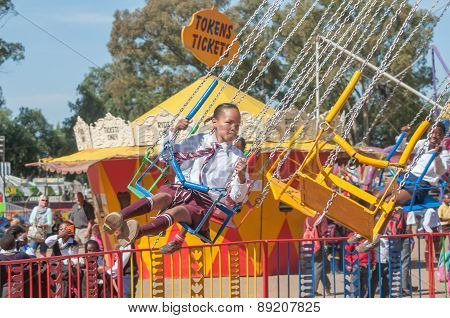 Visitor Enjoying The Amusement Park At The Annual Bloem Show