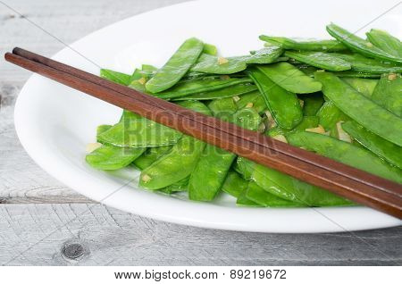 Stir fried snow peas and minced garlic Vietnamese cuisine