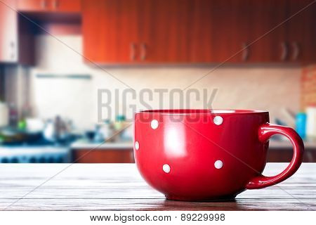 Red Cup On The Kitchen Table
