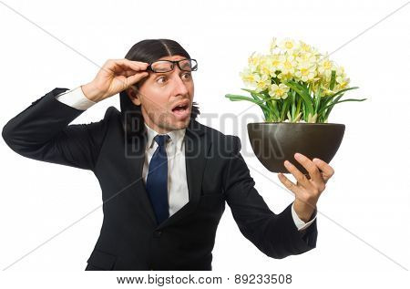 Handsome businessman with flower pot isolated on white