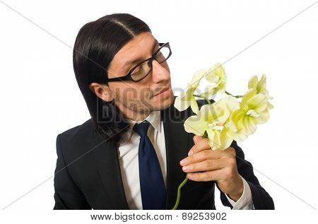 Handsome businessman with flower isolated on white