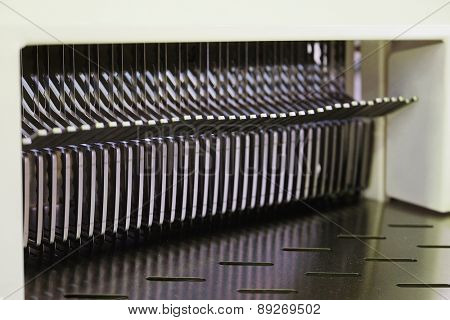 The image of a bread slicer in bakery 