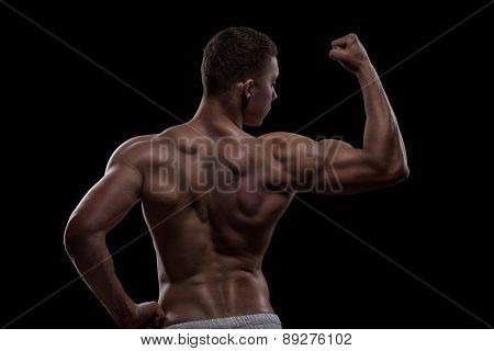 young athlete bodybuilder from back