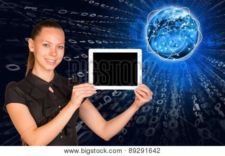 Young woman holging tablet with blank screen