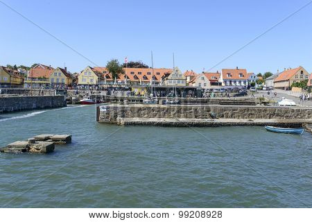 SVANEKE - AUGUST 14 Tourists enjoy the sunny weather and walking along the quay at the port on 14 August 2015 in Svaneke on Bornholm Island, Denmark.