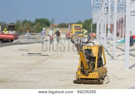Vibrating Plate Compactor At Construction Site