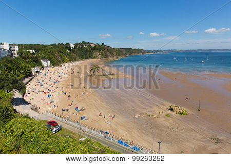 Beautiful weather and summer sunshine drew visitors to Tenby north beach South Wales
