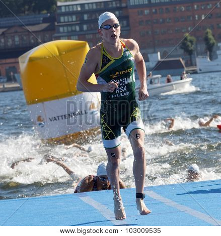 Swimmer Henri Schoeman (rsa) Climbing Up From The Water